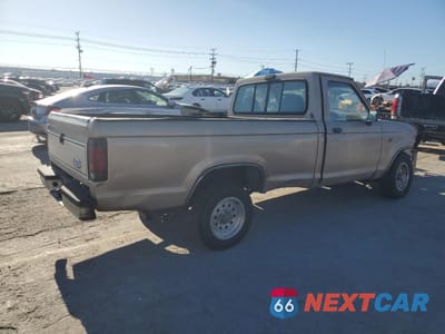 Trzecie zdjęcie samochodu z tyłu: 1992 FORD RANGER VIN:1FTCR10A6NTA92819 - miniatura