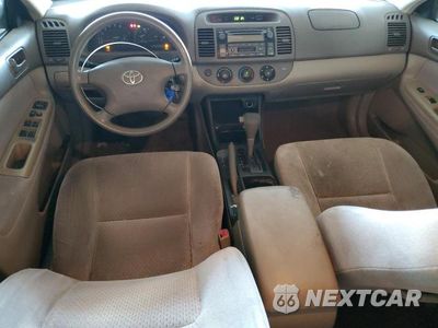 Zdjęcie 8 z 12 samochodu: 2004 TOYOTA CAMRY LE VIN:4T1BF32K04U080322 - miniatura