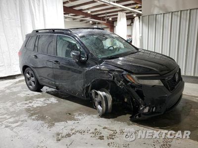 Czwarte zdjęcie samochodu z boku: 2019 HONDA PASSPORT TOURING VIN:5FNYF8H9XKB010610 - miniatura