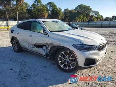 Czwarte zdjęcie samochodu z boku: 2021 BMW X6 SDRIVE 40I VIN:5UXCY4C05M9F19282 - miniatura