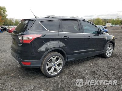Trzecie zdjęcie samochodu z tyłu: 2017 FORD ESCAPE TITANIUM VIN:1FMCU0J90HUB64587 - miniatura