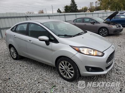 Czwarte zdjęcie samochodu z boku: 2014 FORD FIESTA SE VIN:3FADP4BJ8EM171390 - miniatura