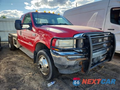 Czwarte zdjęcie samochodu z boku: 2002 FORD F550 SUPER DUTY VIN:1FDAX57FX2ED52771 - miniatura