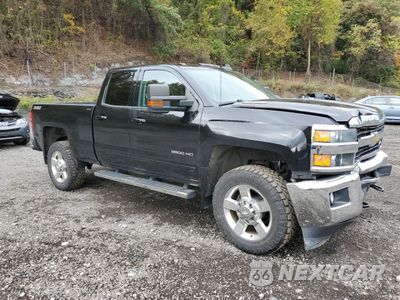 Czwarte zdjęcie samochodu z boku: 2016 CHEVROLET SILVERADO K2500 HEAVY DUTY LT VIN:1GC2KVE81GZ186622 - miniatura
