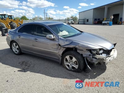 Czwarte zdjęcie samochodu z boku: 2005 ACURA RL VIN:JH4KB16525C013915 - miniatura