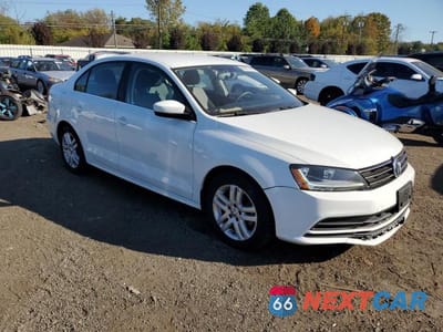 Czwarte zdjęcie samochodu z boku: 2017 VOLKSWAGEN JETTA S VIN:3VW2B7AJ6HM236872 - miniatura