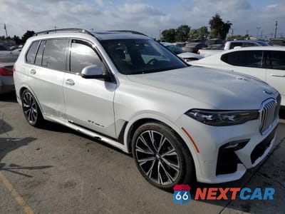 Czwarte zdjęcie samochodu z boku: 2019 BMW X7 XDRIVE50I VIN:5UXCX4C55KLB39499 - miniatura