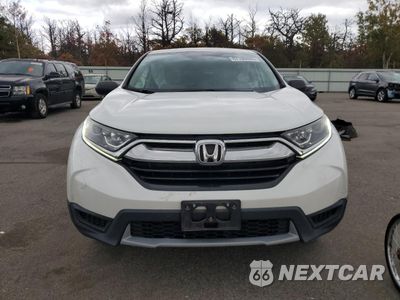 Piąte zdjęcie samochodu w środku: 2019 HONDA CR-V LX VIN:2HKRW6H31KH222866 - miniatura