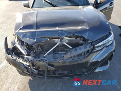 Zdjęcie 11 z 12 samochodu: 2021 BMW M340I VIN:3MW5U7J05M8B56397 - miniatura