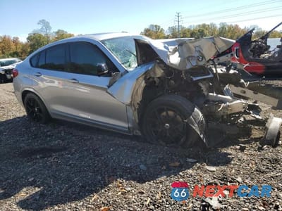 Czwarte zdjęcie samochodu z boku: 2016 BMW X4 XDRIVE28I VIN:5UXXW3C57G0R19430 - miniatura