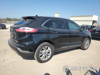 Trzecie zdjęcie samochodu z tyłu: 2019 FORD EDGE TITANIUM VIN:2FMPK4K96KBB23083 - miniatura