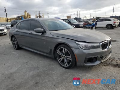 Czwarte zdjęcie samochodu z boku: 2017 BMW 740 I VIN:WBA7E2C59HG740424 - miniatura