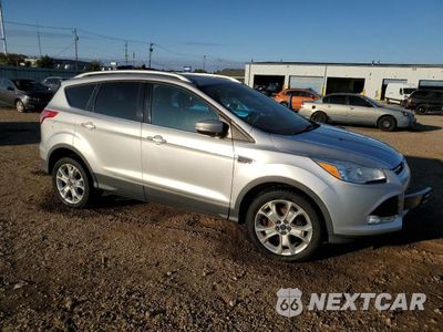 Czwarte zdjęcie samochodu z boku: 2015 FORD ESCAPE TITANIUM VIN:1FMCU0JXXFUC40800 - miniatura