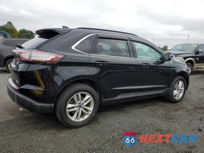 Trzecie zdjęcie samochodu z tyłu: 2018 FORD EDGE SEL VIN:2FMPK4J91JBC24256 - miniatura