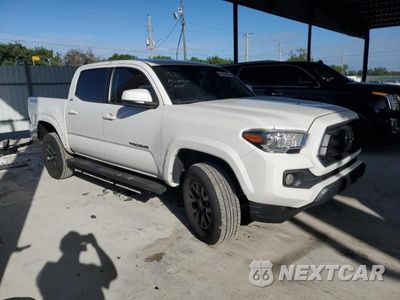 Czwarte zdjęcie samochodu z boku: 2023 TOYOTA TACOMA DOUBLE CAB VIN:3TMAZ5CN6PM213217 - miniatura
