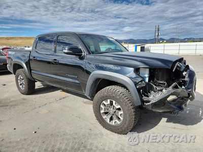 Czwarte zdjęcie samochodu z boku: 2018 TOYOTA TACOMA DOUBLE CAB VIN:5TFCZ5AN3JX139090 - miniatura