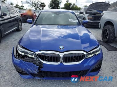 Piąte zdjęcie samochodu w środku: 2021 BMW 330I VIN:3MW5R1J07M8B61793 - miniatura