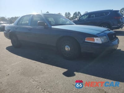 Czwarte zdjęcie samochodu z boku: 2003 FORD CROWN VICTORIA POLICE INTERCEPTOR VIN:2FAFP71W83X143257 - miniatura
