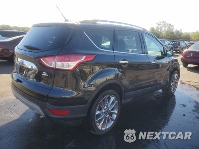 Trzecie zdjęcie samochodu z tyłu: 2015 FORD ESCAPE SE VIN:1FMCU9GX1FUA93441 - miniatura