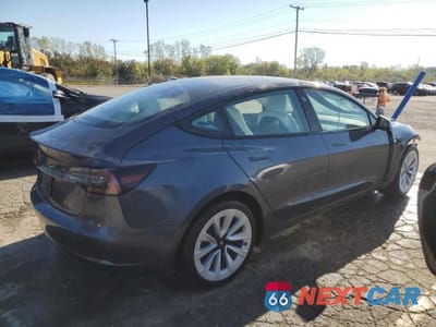 Trzecie zdjęcie samochodu z tyłu: 2023 TESLA MODEL 3 VIN:5YJ3E1EA2PF641832 - miniatura