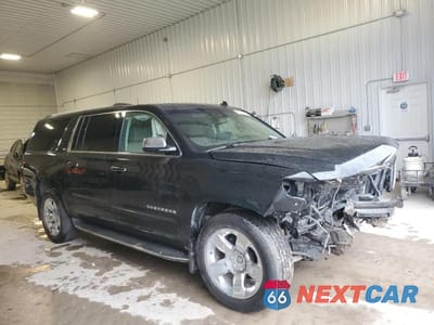 Czwarte zdjęcie samochodu z boku: 2015 CHEVROLET SUBURBAN K1500 LTZ VIN:1GNSKKKCXFR149520 - miniatura
