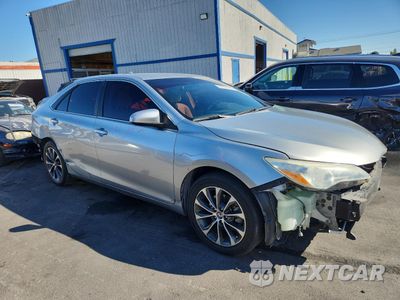 Czwarte zdjęcie samochodu z boku: 2015 TOYOTA CAMRY HYBRID VIN:4T1BD1FK6FU145620 - miniatura