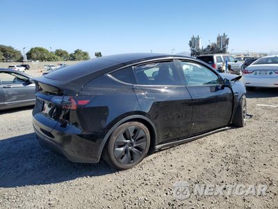 Trzecie zdjęcie samochodu z tyłu: 2024 TESLA MODEL Y VIN:7SAYGAEE4RF211941 - miniatura