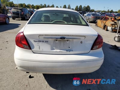 Zdjęcie 6 z 12 samochodu: 2000 FORD TAURUS SES VIN:1FAFP5523YG208699 - miniatura
