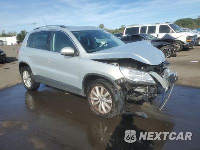 Czwarte zdjęcie samochodu z boku: 2011 VOLKSWAGEN TIGUAN S VIN:WVGBV7AX5BW527753 - miniatura