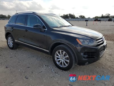 Czwarte zdjęcie samochodu z boku: 2012 VOLKSWAGEN TOUAREG V6 VIN:WVGFF9BP5CD003380 - miniatura