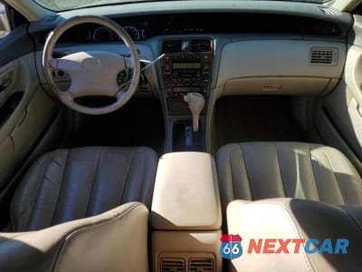 Zdjęcie 8 z 12 samochodu: 2000 TOYOTA AVALON XLS VIN:4T1BF28B3YU072030 - miniatura