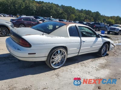 Trzecie zdjęcie samochodu z tyłu: 1999 CHEVROLET MONTE CARLO LS VIN:2G1WW12M2X9219727 - miniatura