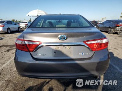 Zdjęcie 6 z 14 samochodu: 2015 TOYOTA CAMRY HYBRID VIN:4T1BD1FK1FU172949 - miniatura