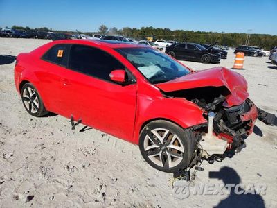 Czwarte zdjęcie samochodu z boku: 2010 KIA FORTE SX VIN:KNAFW6A38A5135099 - miniatura