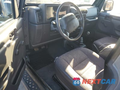 Zdjęcie 8 z 12 samochodu: 2001 JEEP WRANGLER / TJ SPORT VIN:1J4FA49S51P333140 - miniatura