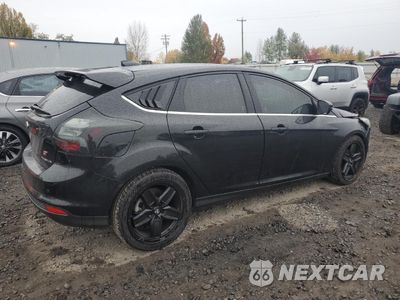 Trzecie zdjęcie samochodu z tyłu: 2012 FORD FOCUS TITANIUM VIN:1FAHP3N2XCL324270 - miniatura