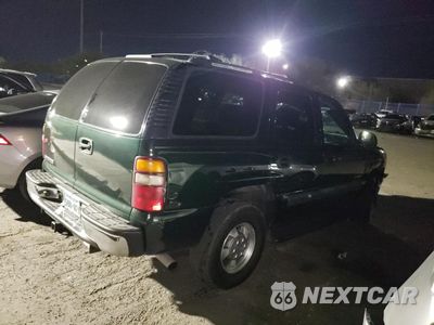 Trzecie zdjęcie samochodu z tyłu: 2002 CHEVROLET TAHOE C1500 VIN:1GNEC13VX2J315094 - miniatura