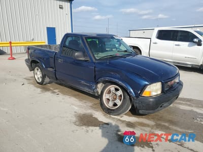 Czwarte zdjęcie samochodu z boku: 1999 GMC SONOMA VIN:1GTCS1448X8532800 - miniatura