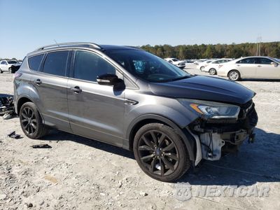 Czwarte zdjęcie samochodu z boku: 2017 FORD ESCAPE TITANIUM VIN:1FMCU0J91HUB26138 - miniatura