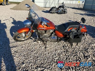 Trzecie zdjęcie samochodu z tyłu: 2006 HONDA VTX1300 C VIN:1HFSC550X6A214198 - miniatura