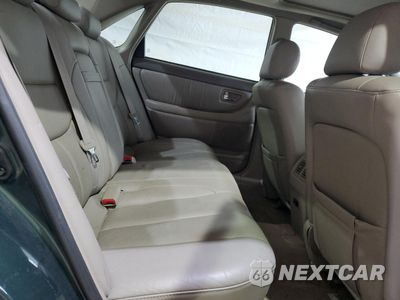 Zdjęcie 10 z 12 samochodu: 2002 TOYOTA AVALON XL VIN:4T1BF28B02U237121 - miniatura