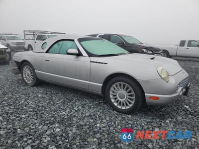 Czwarte zdjęcie samochodu z boku: 2004 FORD THUNDERBIRD VIN:1FAHP60A44Y110136 - miniatura