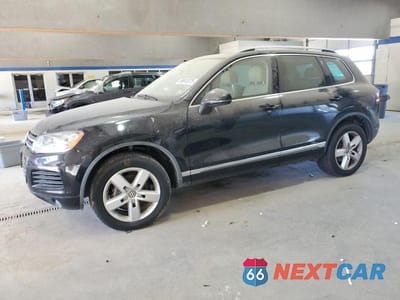 2014 VOLKSWAGEN TOUAREG V6 TDI WVGEP9BP4ED001471 - główne zdjęcie licytacji z USA - miniatura