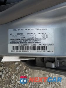 Zdjęcie 12 z 12 samochodu: 2003 MAZDA PROTEGE DX VIN:JM1BJ225530104806 - miniatura