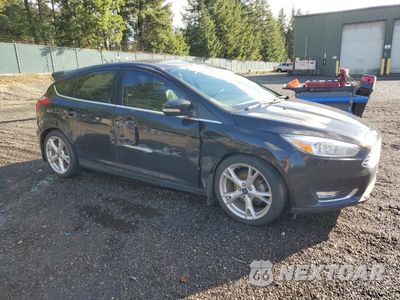 Czwarte zdjęcie samochodu z boku: 2015 FORD FOCUS TITANIUM VIN:1FADP3N26FL275765 - miniatura