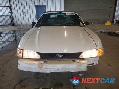 Piąte zdjęcie samochodu w środku: 1996 FORD MUSTANG VIN:1FALP4443TF233780 - miniatura