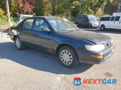 Czwarte zdjęcie samochodu z boku: 1997 TOYOTA COROLLA BASE VIN:2T1BA02E1VC220338 - miniatura