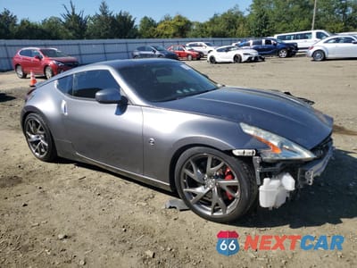 Czwarte zdjęcie samochodu z boku: 2014 NISSAN 370Z BASE VIN:JN1AZ4EH6EM631600 - miniatura