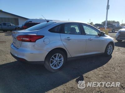 Trzecie zdjęcie samochodu z tyłu: 2018 FORD FOCUS SE VIN:1FADP3F28JL318221 - miniatura