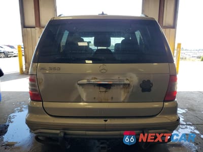 Zdjęcie 6 z 13 samochodu: 2005 MERCEDES-BENZ ML 350 VIN:4JGAB57E65A563497 - miniatura